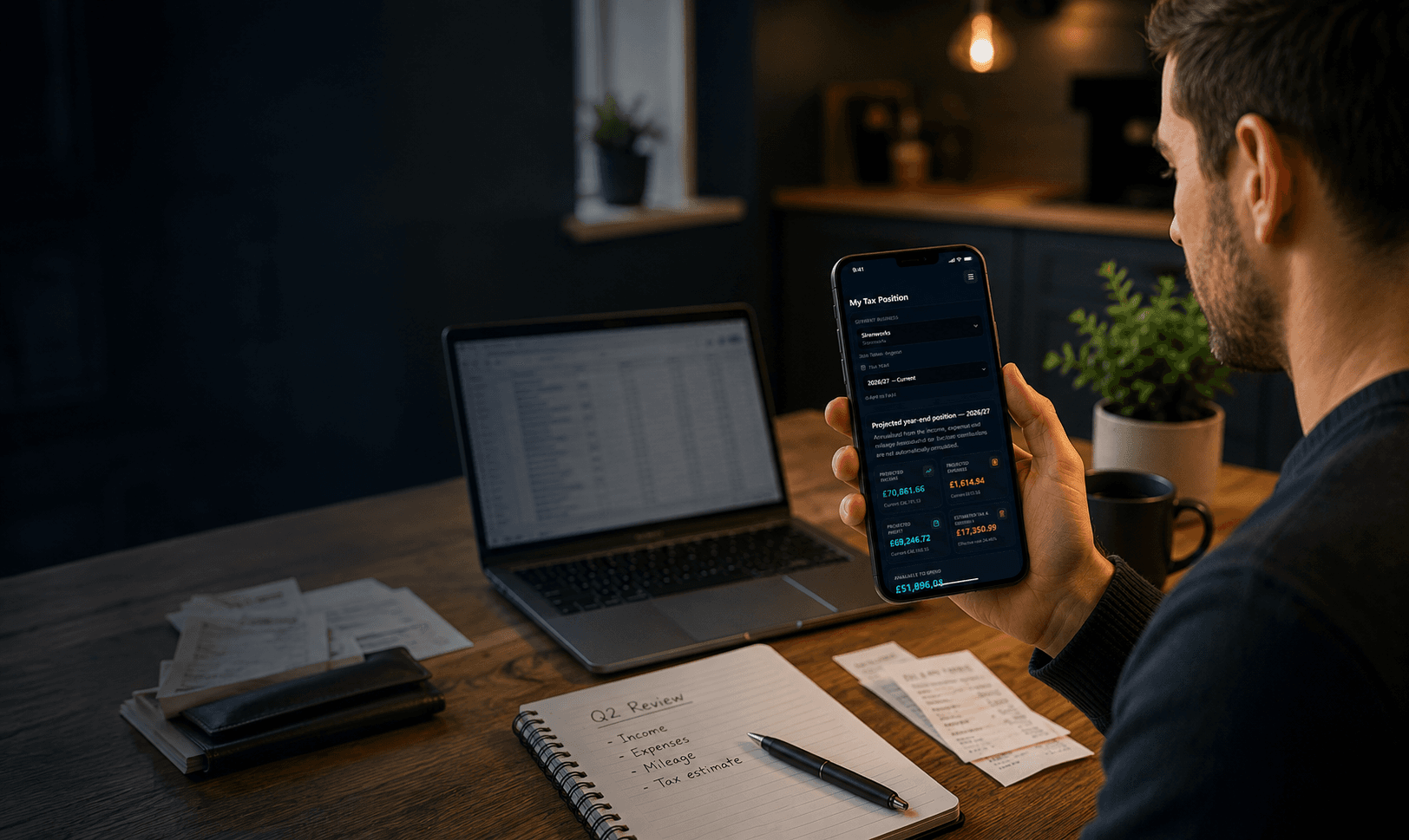 Self-employed person checking their TaxVault tax position on a smartphone